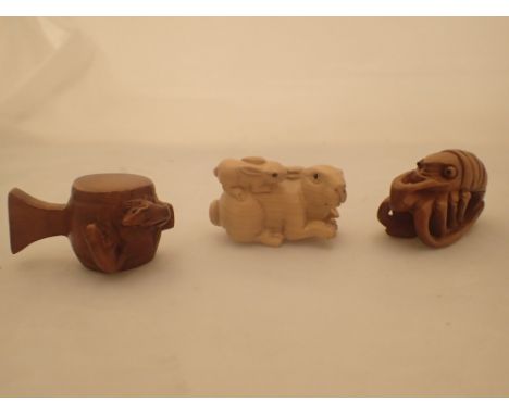 Three hard carved boxwood Netsuke animal figurines