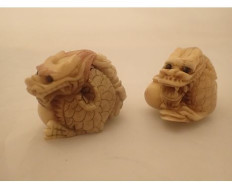 Hand carved antique pair of dragons with egg carved nut Oriental Netsuke with signature L: 4 cm