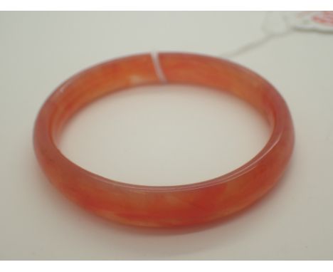 Orange jade bangle D: 7 cm