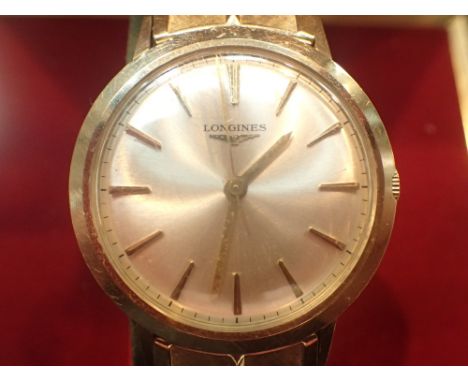 10ct yellow gold filled Longines wristwatch on expanding strap with original box    CONDITION REPORT:  Good condition with no