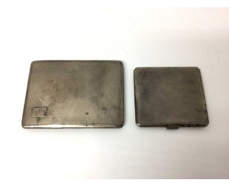 Two George V silver cigarette cases with engine turned decoration, various dates and makersApprox 7 oz total.