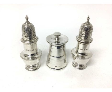 Silver pepper grinder, James Dixon &amp; Sons, Sheffield 1940, together with a pair of silver casters, London 1968Approx 9 1/