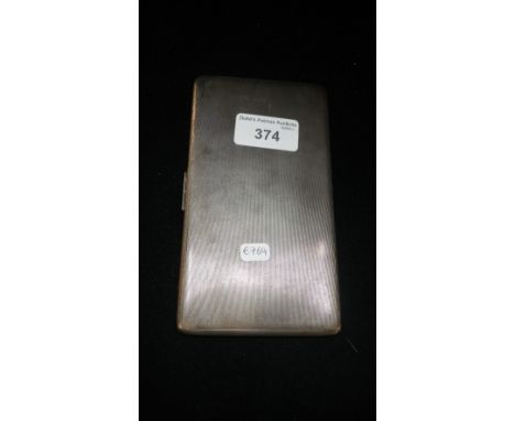 A large silver engine-turned cigarette case