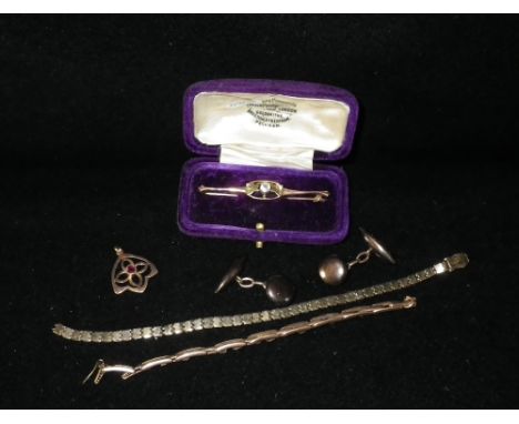A pair of 9ct yellow gold bullet and button cufflinks and a collection of other gold items, including a bar brooch and pendan