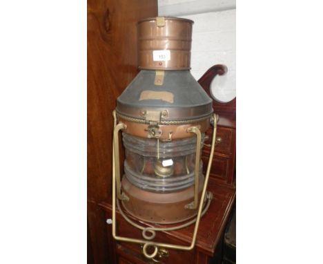 A copper ships lamp inscribed 'Anchor' 
