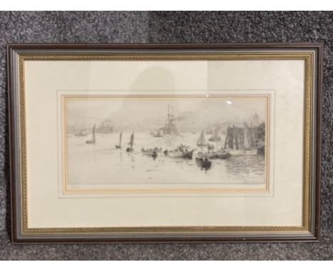 An etching by William Lionel Wyllie depicting a bustling harbour scene signed 18 x 38cm