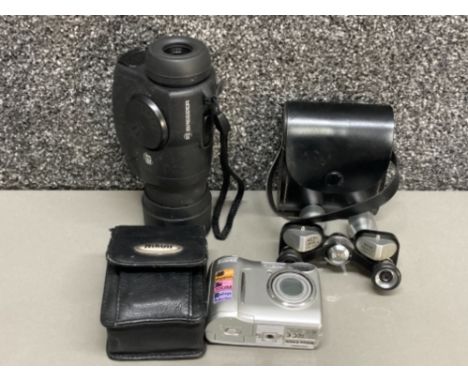 Bisley deluxe triple tested 10 x 20 field binoculars, a Bresser spotting scope and a Nikon compact camera