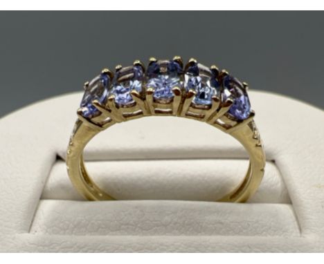 Ladies 9ct gold 5 stone light tanzanite ring. Size N