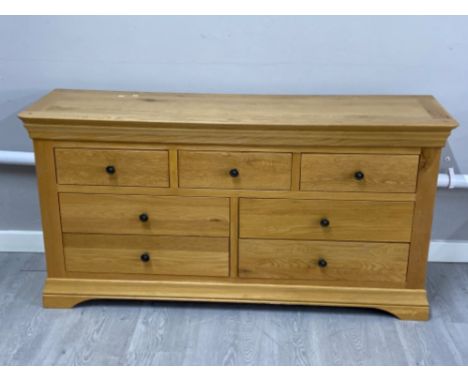 Light oak 7 drawer low sideboard