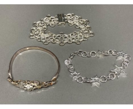 Two silver bracelets and a silver bangle 51.2g