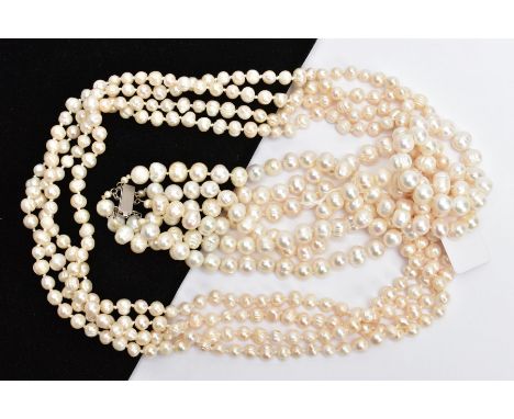 TWO CULTURED FRESH WATER PEARL NECKLACES, to include a three-strand necklace fitted with a white metal integrated push pin cl