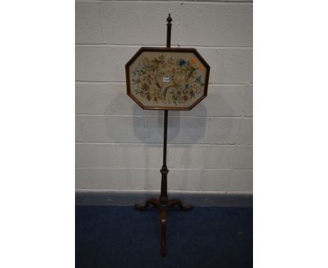 A GEORGIAN MAHOGANY POLE SCREEN, the adjustable panel depicting various birds, on turned support and tripod legs, height 146c