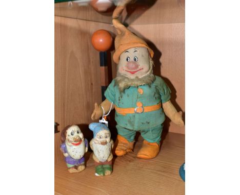 A CHAD VALLEY DISNEY SEVEN DWARFS DOC FIGURE, pressed felt with painted features, green linen suit with orange felt hat, belt