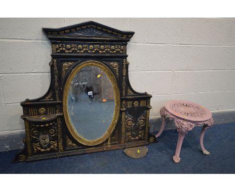 A DISTRESSED CAST IRON OVERMANTEL MIRROR, overpainted gilt and black, oval mirror, 120cm x 100cm (condition-missing one shelf