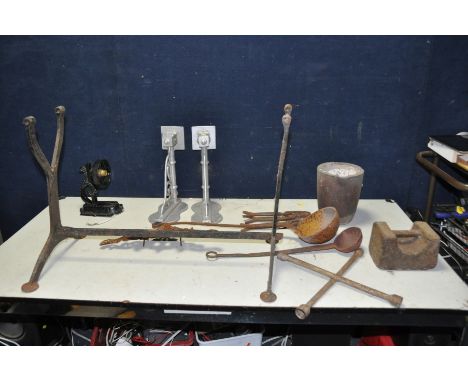 A COLLECTION OF VINTAGE METALWARE including a Smelting pot, ladles and grips, two cast aluminium brackets, a weight, a stand,