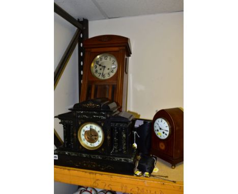 A LATE VICTORIAN BLACK SLATE AND MARBLE MANTLE CLOCK, TWO OTHER CLOCKS AND TWO PAIRS OF BINOCULARS, the slate clock with dama