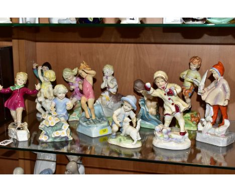A SET OF TWELVE ROYAL WORCESTER MONTHS OF THE YEAR FIGURES MODELLED BY FREDA DOUGHTY, comprising 'January' 3452, 'February' 3