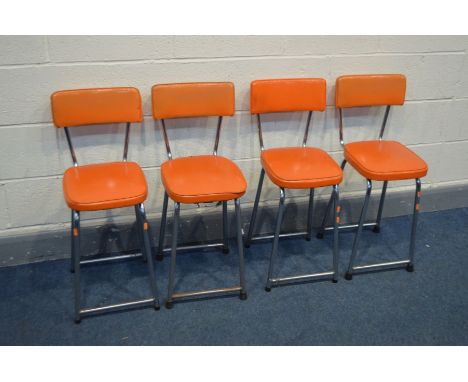 A SET OF FOUR VINTAGE KERON CHAIRS, covered in orange upholstery, labelled to underside