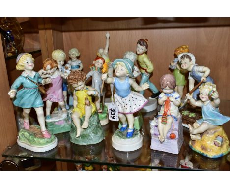 FOURTEEN ROYAL WORCESTER CHILD'S BLESSING BOY AND GIRL DAYS OF THE WEEK FIGURES, comprising Monday 3257 and 3519, Tuesday 325