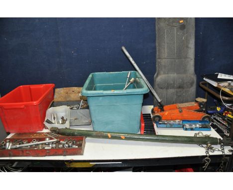 A COLLECTION OF MECHANICS TOOLS including a wheeled Creeper, a trolley jack, impact sockets, an adjustable towing bar, socket