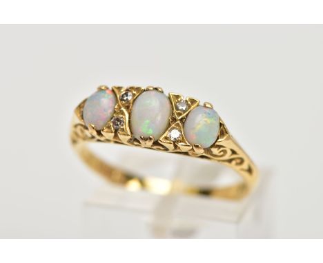 AN 18CT GOLD OPAL AND DIAMOND HALF HOOP RING, three oval cabochon opals graduating in size with eight cut diamonds points, to