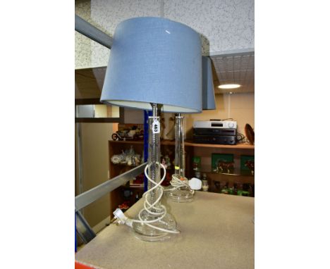 A PAIR OF LAURA ASHLEY CUT GLASS TABLE LAMPS, fitted with blue Laura Ashley lamp shades, height approximately 61cm including 
