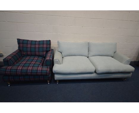 A HARLEQUIN TWO PIECE LOUNGE SUITE, matching frames but different upholstery and colours, comprising a pale blue sofa (cleani