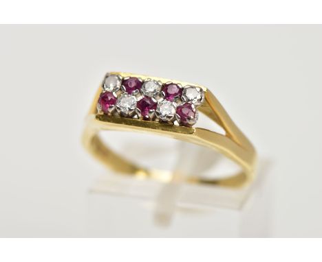 AN 18CT GOLD RUBY AND DIAMOND DRESS RING, rectangular ring head set with two rows of circular cut rubies and round brilliant 