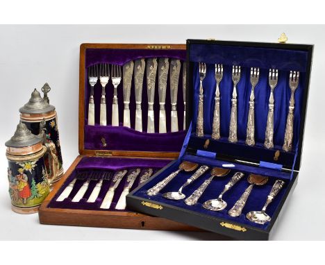 TWO CANTEENS OF CUTLERY AND TWO GERMAN CERAMIC BEER STEINS, to include a walnut canteen complete with a twenty-four-piece EPN