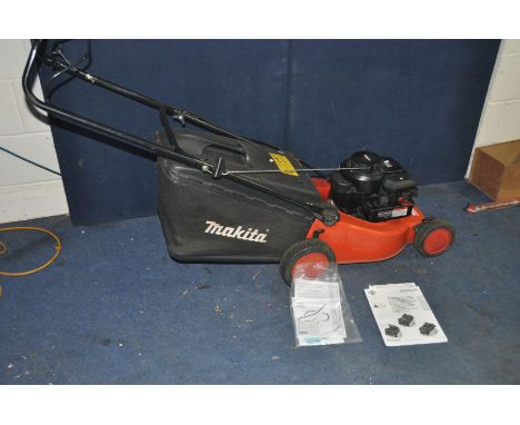 A MAKITA EUM430 PETROL LAWN MOWER with grass bag and manual (engine pulls and starts)