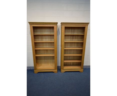 A PAIR OF SOLID OAK FRENCH STYLE OPEN BOOKCASES, each with four adjustable shelves, width 101cm x depth 33cm x height 196cm (