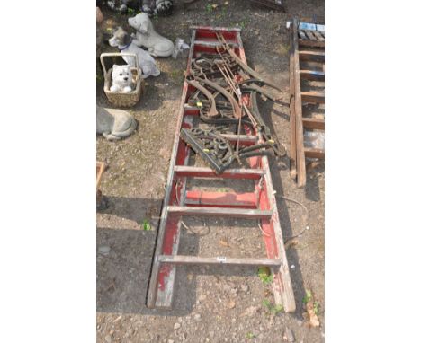 THREE PAIRS OF MODERN CAST ALUMINIUM BENCH ENDS and a slightly distressed wooden step ladder (4)