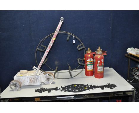 A VINTAGE IRON SPORTS PITCH LINE MARKER, a vintage iron hose reel 67cm in diameter, three vintage Magnet Fire Extinguishers a