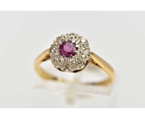 AN 18CT GOLD RUBY AND DIAMOND CLUSTER RING, centring on a circular cut ruby, within a single cut diamond surround, tapered sh