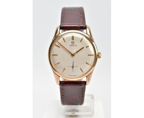 A GENTS 9CT GOLD OMEGA WRISTWATCH, hand wound movement, round champagne dial signed 'Omega', baton markers, seconds subsidiar