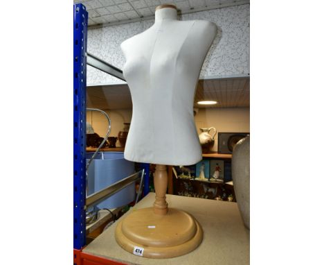 A SPERLING MODELS FEMALE MANNEQUIN BODY, height adjustable via a chrome column attached to a wooden base, maximum height appr