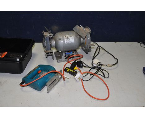 A HILKA 6in BENCH GRINDER ( stand cracked and missing parts), a Black and Decker jigsaw and a Uhu glue gun ( all PAT pass and