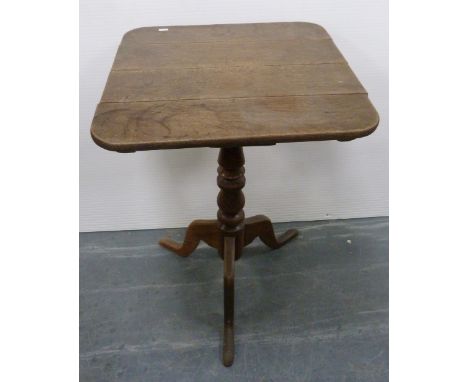 George III oak table, with square top on ring-turned column and tripod base, 75cm high and 55cm wide.CONDITION REPORT: Splits