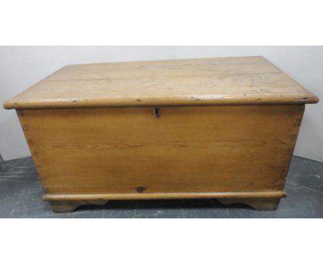 Victorian pine blanket chest with hinged top enclosing a candle box, iron lock, on bracket feet, 51cm high, 96cm wide and 48c