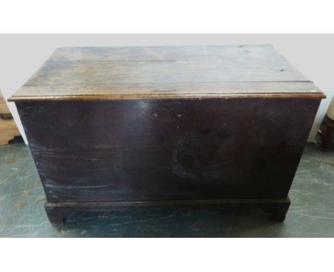 Victorian stained pine mule-type chest enclosing a candle box, with iron locks and brackets, on bracket feet, 66cm high, 124c