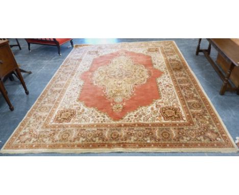 Large Aubusson-style machine-made carpet with Persian influence, with large floral medallion to the centre within all over fo