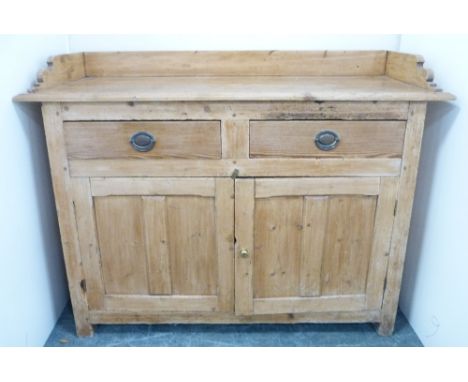 Victorian Scotch pine dresser with three-quarter galleried top above two short drawers and two cupboard doors, 103cm high, 13