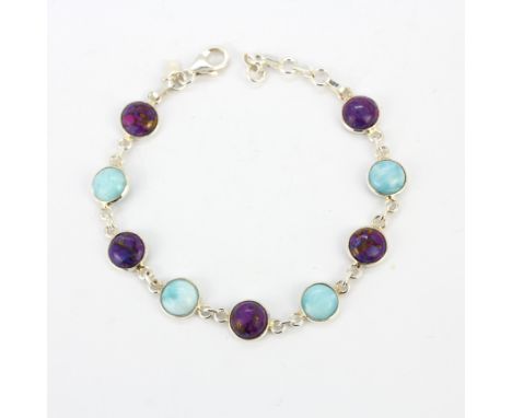 A 925 silver bracelet set with larimar and lapis lazuli, L.19.5cm.