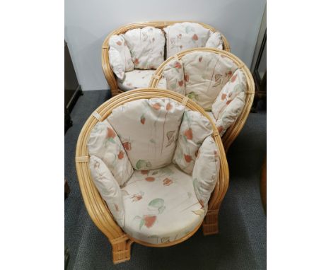 A three piece cane conservatory suite, settee/sofa L. 128cm H. 74cm.