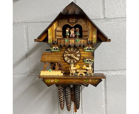 A vintage Schneider cuckoo clock, H. 45cm.