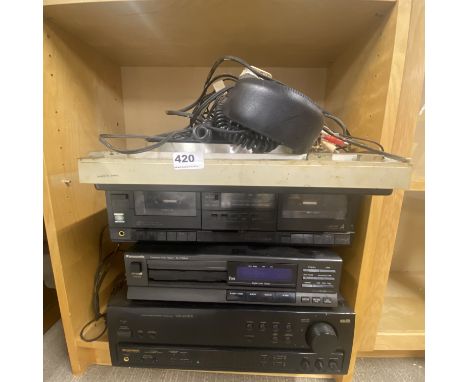 A vintage JBC record deck with tape player, Panasonic CD player and further amplifier.