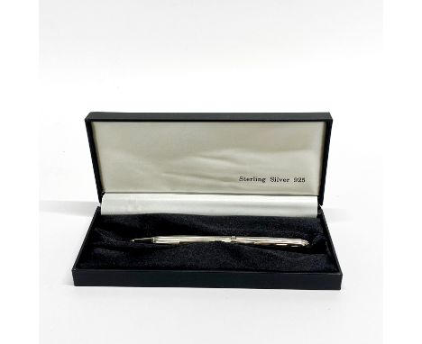 A cased sterling silver ballpoint pen.