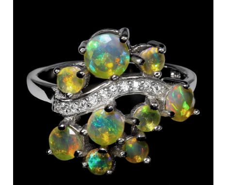 A matching 925 silver ring set with opals and white stones, ring size P.5.