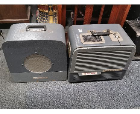 A Bell and Howell portable projector and speaker.