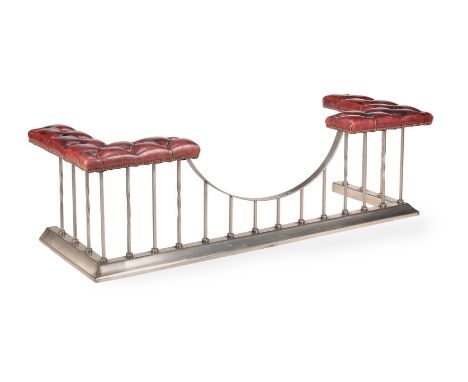 A STEEL AND RED LEATHER UPHOLSTERED CLUB FENDER20TH CENTURYThe rests above the U-shaped frontExternal measurements: 51cm high